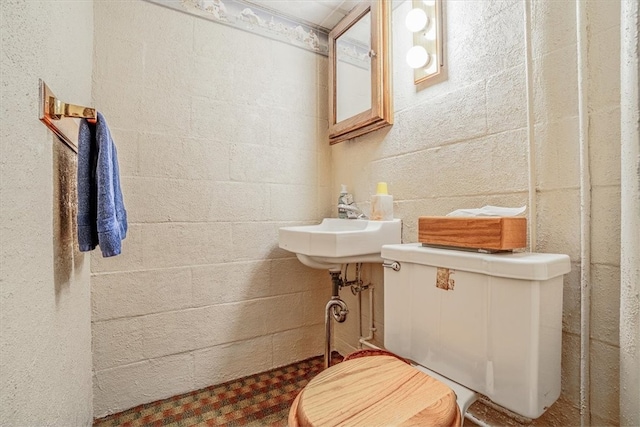 bathroom featuring toilet