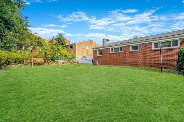 view of yard featuring central AC unit