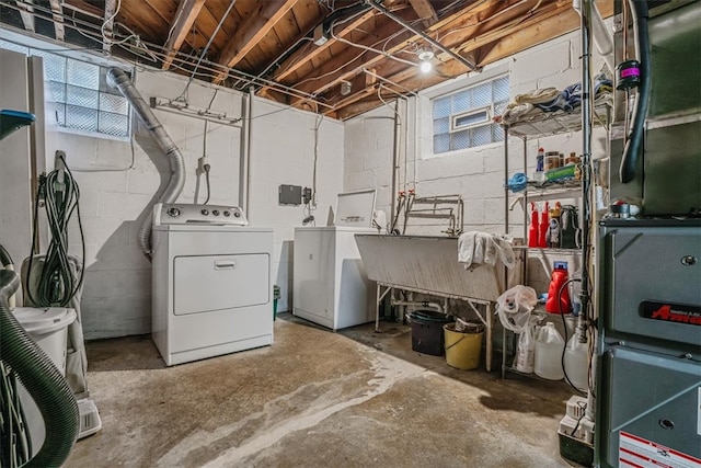 basement with washer and clothes dryer