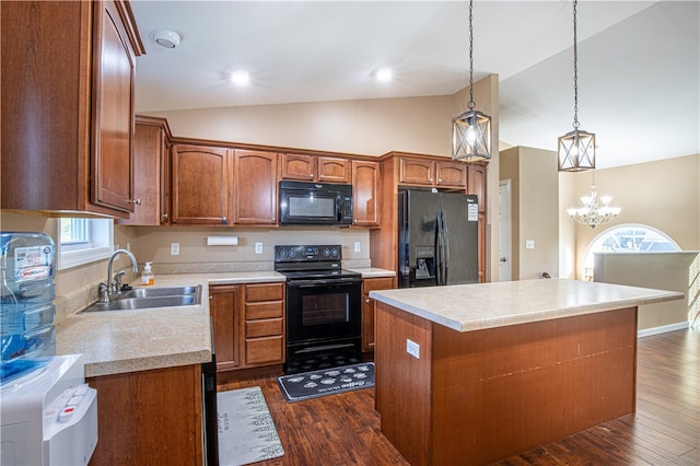 kitchen featuring dark hardwood / wood-style floors, black appliances, sink, and vaulted ceiling