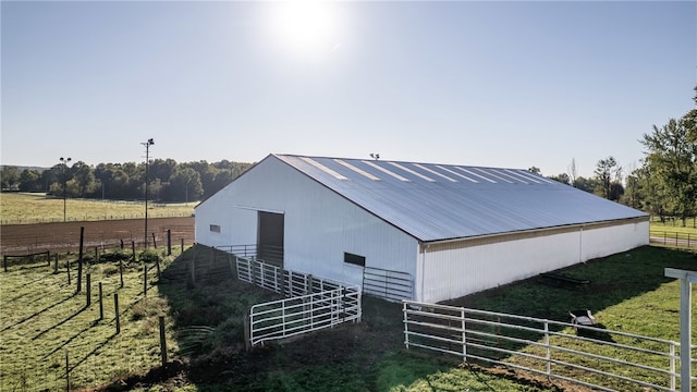 view of outdoor structure featuring a rural view