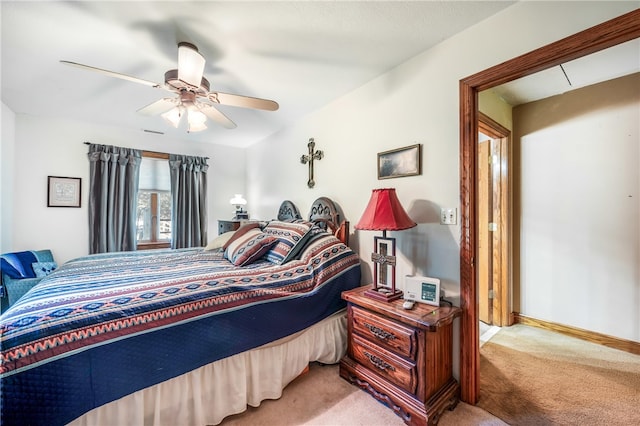 bedroom with ceiling fan and carpet flooring