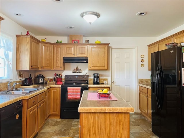409 Ceylon Rd, Carmichaels/Cumblnd, PA 15320 - kitchen with black appliances, under cabinet range hood, a sink, light countertops, and a center island