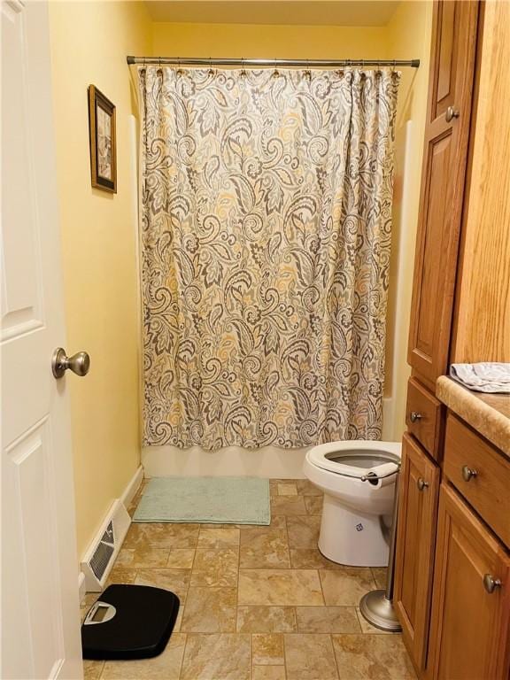 409 Ceylon Rd, Carmichaels/Cumblnd, PA 15320 - full bathroom featuring toilet, shower / bathtub combination with curtain, vanity, and stone finish floors