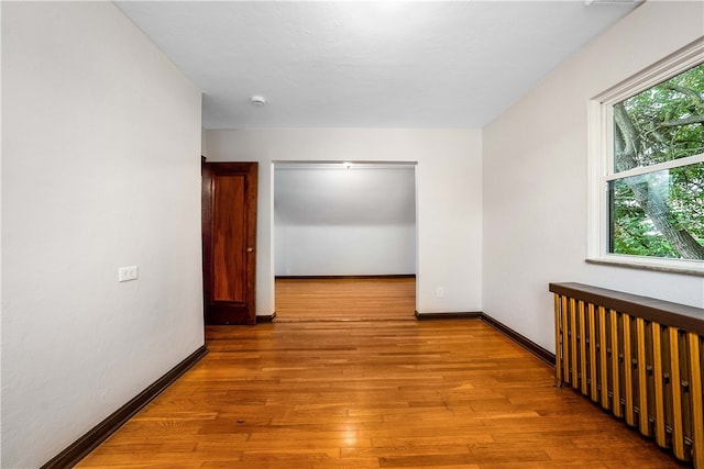 corridor featuring light hardwood / wood-style flooring