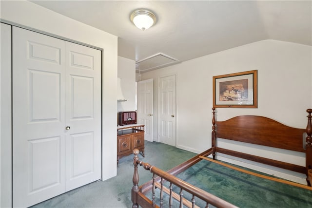 carpeted bedroom featuring lofted ceiling