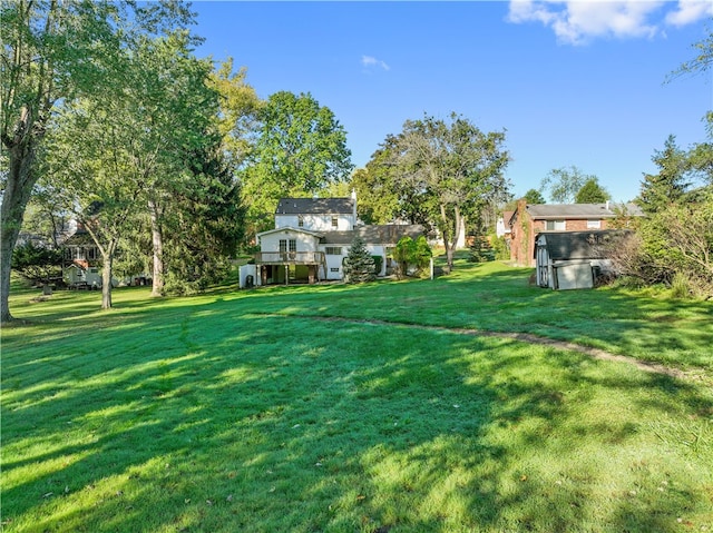 view of yard with a deck