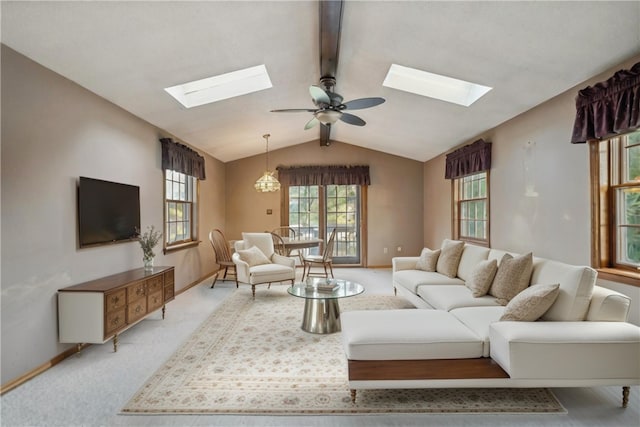 living room featuring ceiling fan, light carpet, and vaulted ceiling with beams