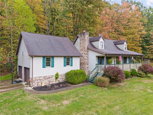 cape cod home with a porch, a garage, and a front yard