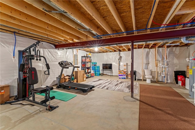 workout area with water heater and electric panel