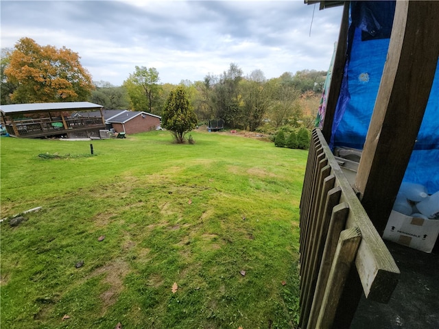 view of yard with a deck