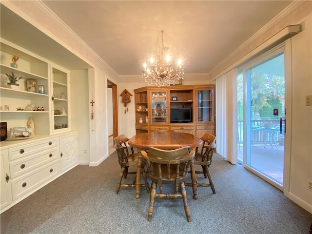 carpeted dining room featuring crown molding and a chandelier