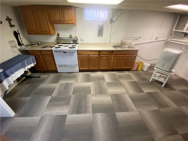 kitchen featuring sink and electric stove