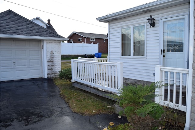 view of side of home featuring a garage