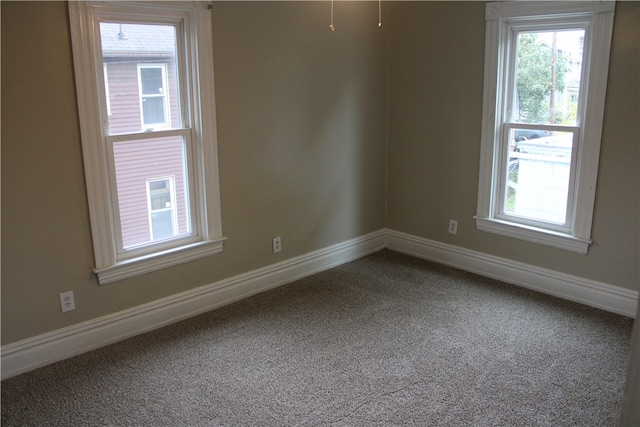 unfurnished room with carpet floors