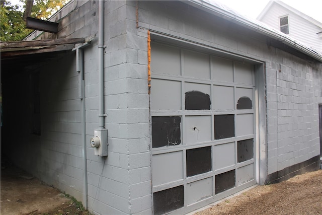 view of property exterior with a garage