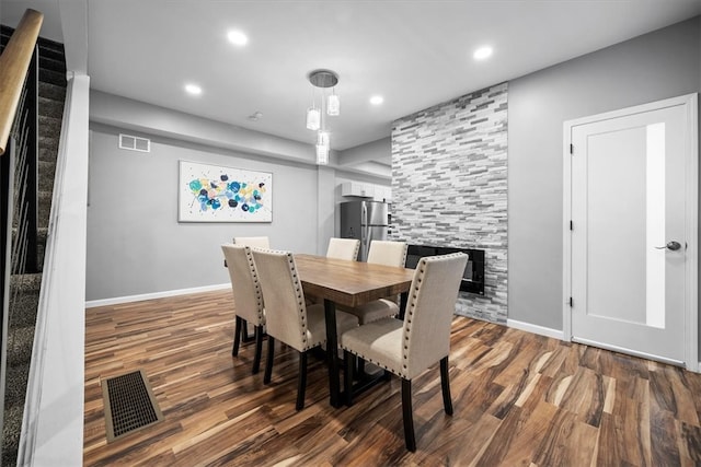 dining room featuring dark hardwood / wood-style flooring