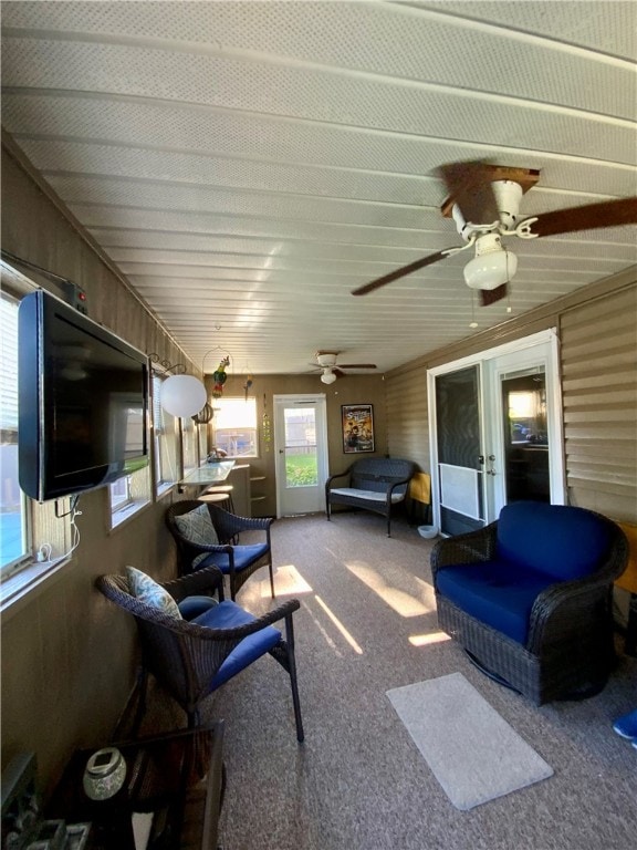 view of patio featuring ceiling fan