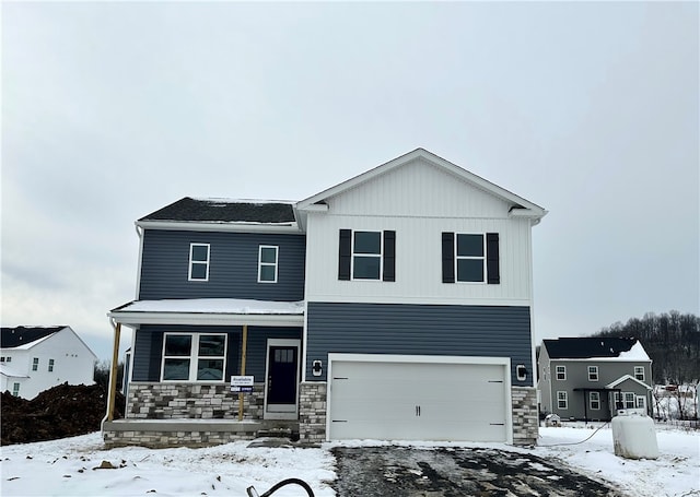 view of front of property with a garage