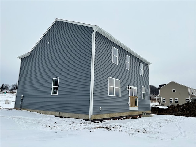 view of snow covered property