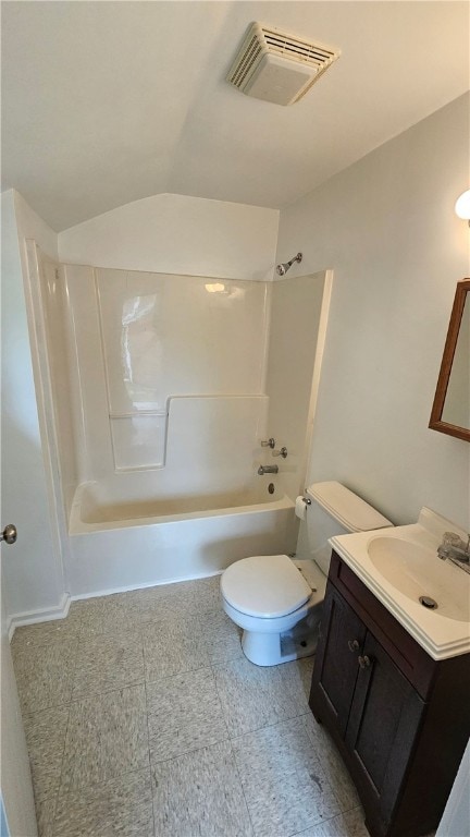 full bathroom featuring shower / tub combination, vaulted ceiling, toilet, and vanity