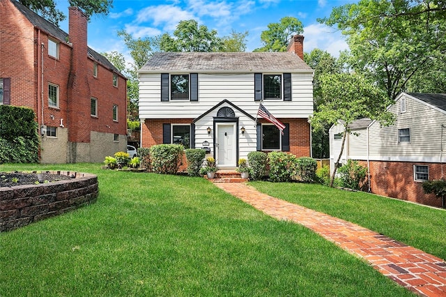 view of front of property with a front lawn