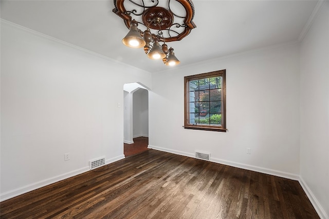 unfurnished room featuring crown molding and dark hardwood / wood-style flooring