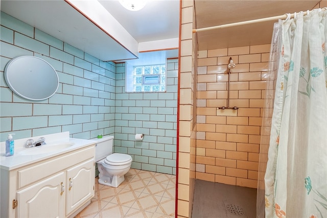 bathroom featuring vanity, toilet, tile walls, and curtained shower