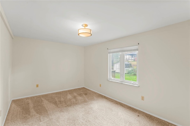 spare room with carpet flooring