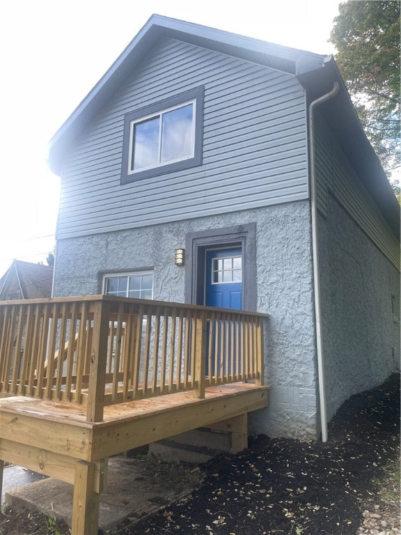 rear view of house with a deck