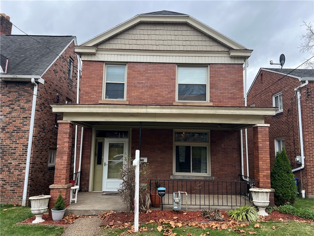 2316 Fairland St, Overbrook, PA 15210 - view of front of home featuring a porch and brick siding