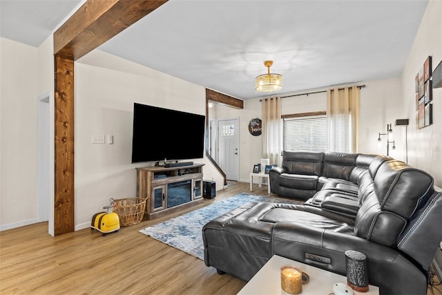 living room with light hardwood / wood-style flooring