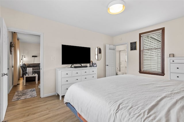 bedroom with light hardwood / wood-style flooring