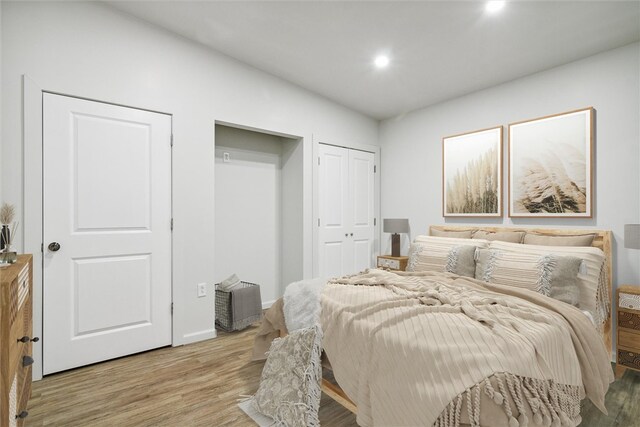 616 S Mathilda St, Bloomfield, PA 15224 - bedroom featuring light wood-style flooring, baseboards, and recessed lighting