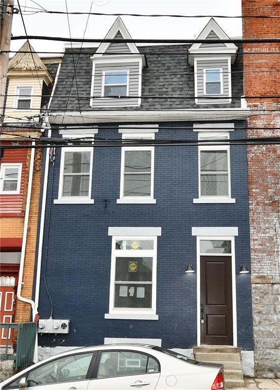 616 S Mathilda St, Bloomfield, PA 15224 - townhome / multi-family property with brick siding and entry steps