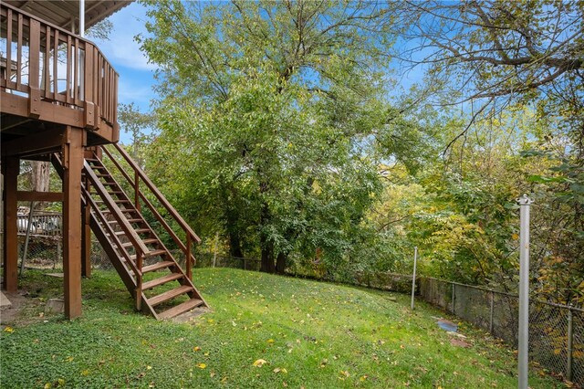 view of yard with a wooden deck