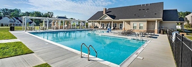 view of pool featuring a patio