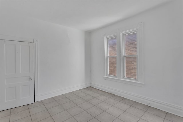 view of tiled spare room