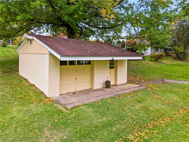 garage with a lawn