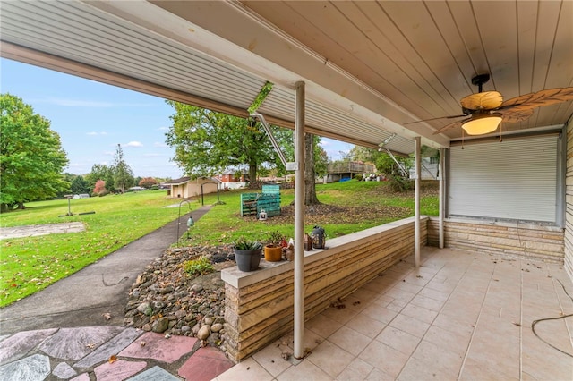 view of patio / terrace featuring ceiling fan