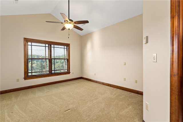 unfurnished room featuring lofted ceiling, carpet floors, and ceiling fan