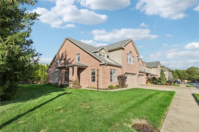 view of side of home featuring a yard and a garage