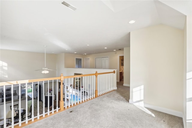 hallway featuring carpet floors