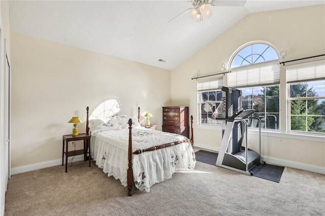 bedroom with ceiling fan, high vaulted ceiling, carpet, and multiple windows