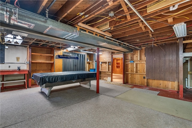 basement with billiards and wooden walls