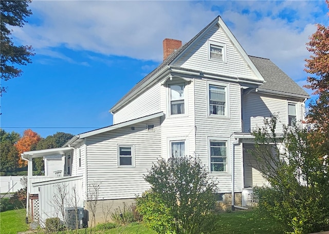 exterior space featuring central AC unit