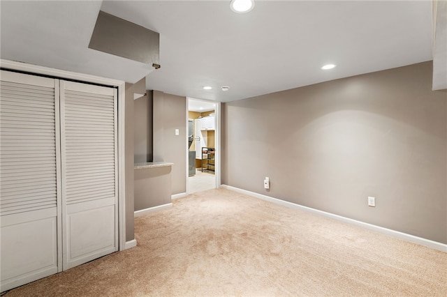 interior space featuring light colored carpet