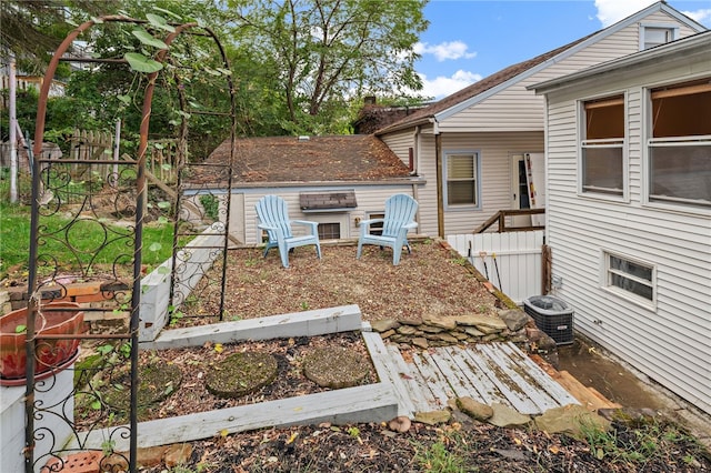 exterior space featuring central AC unit