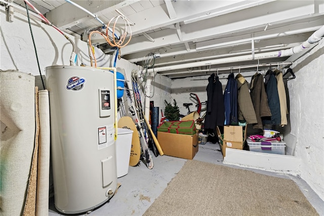 utility room featuring electric water heater