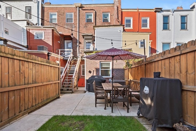 back of house with a patio